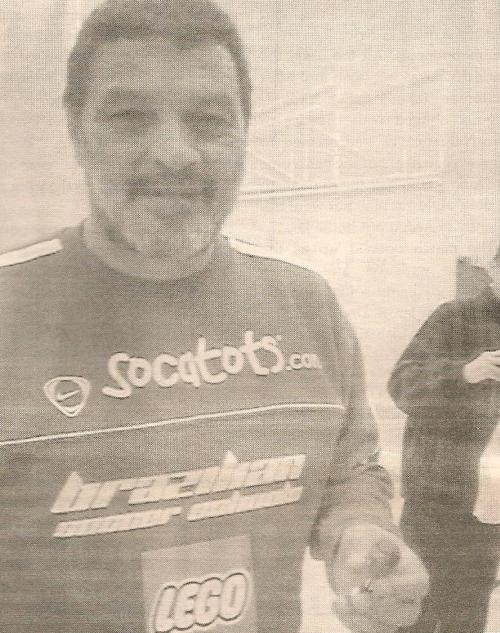 Brazil legend Socrates with a Tino Asprilla figurine